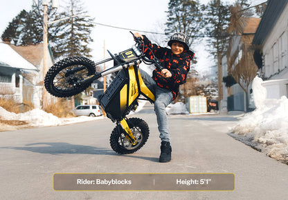 HEYBIKE Villain performing a wheelie